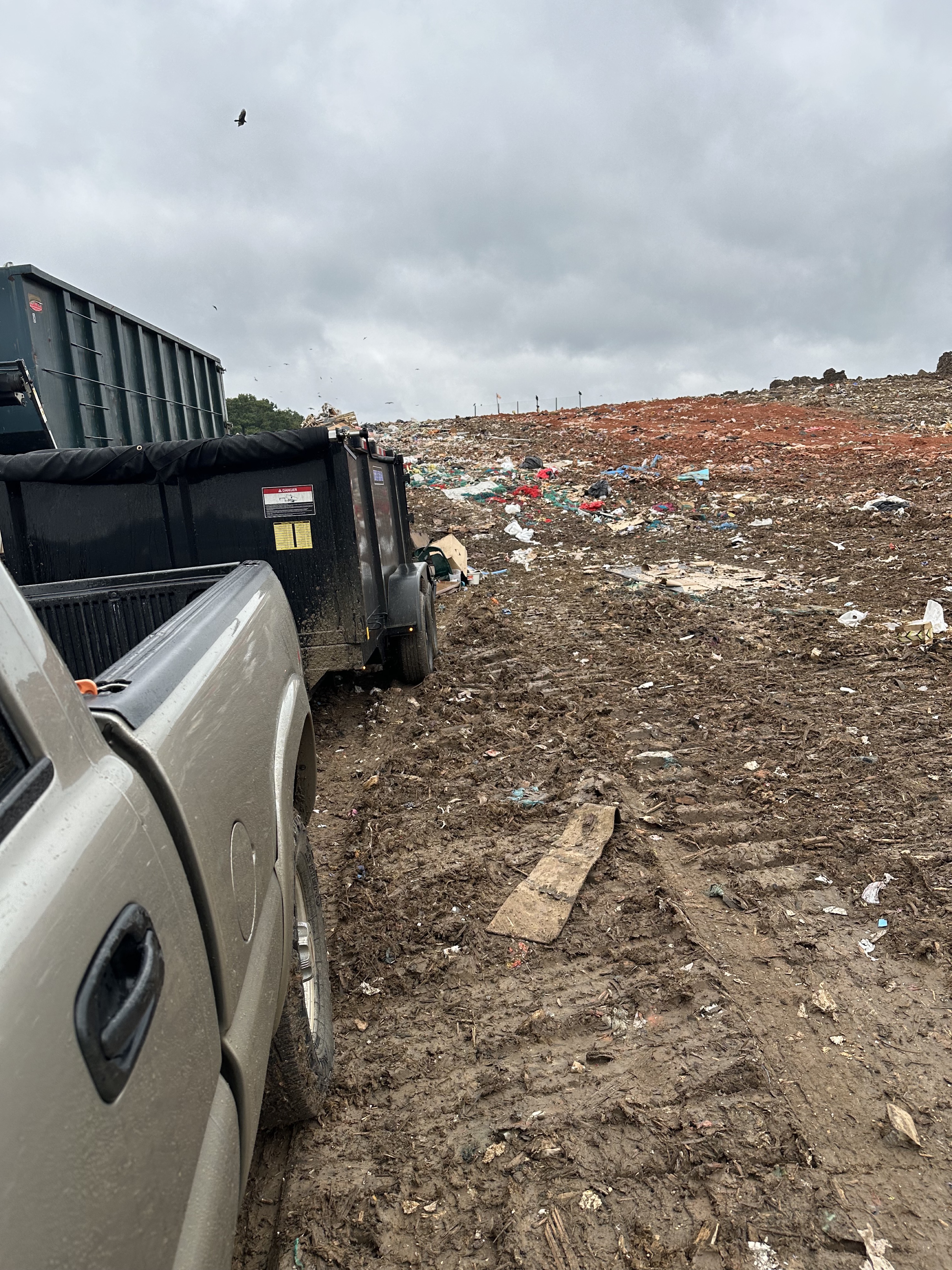 Truck and dump trailer at landfill